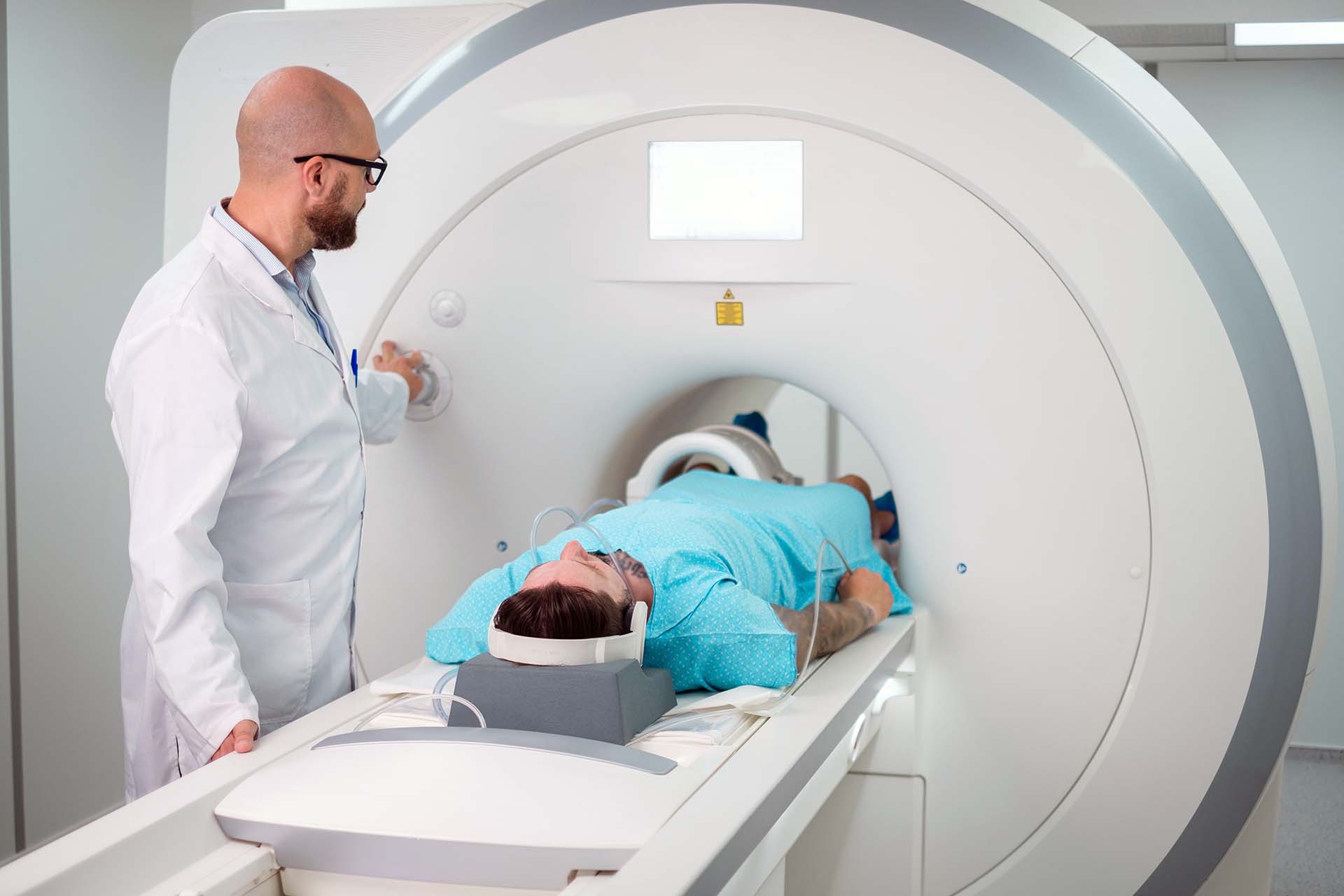 doctor and patient using mri machine